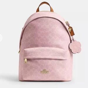 COACH Taylor Small Backpack In Signature Canvas With Charms CEF46
Powder Pink